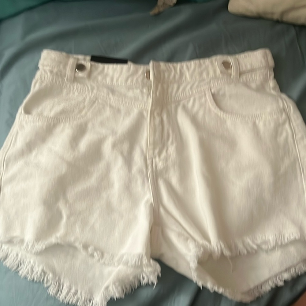 White Myra Bag shirts with tags